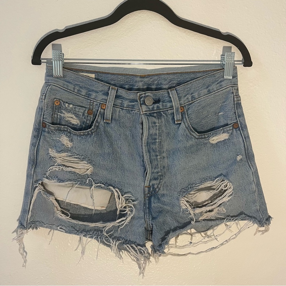 Levi’s 501 high waisted distressed denim shorts
